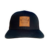 Utica Coffee Leather Patch Black Trucker Hat